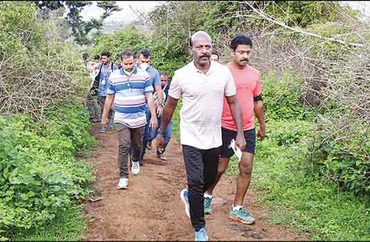 TN Health Minister climbs 15 km stretch in hill to address tribal issues, people welcomes Subramaniam